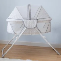 Delta Children EZ Fold Ultra Compact Travel Bassinet