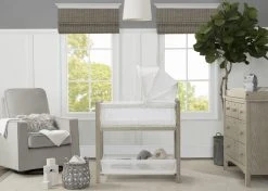 Simmons Kids Farmhouse 2-in-1 Wood Bedside Bassinet Sleeper And Changer Bassinets