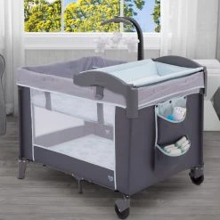 Delta Children LX Deluxe Portable Baby Play Yard With Removable Bassinet And Changing Table