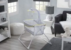 Delta Children Deluxe Activity Sleeper Bassinet