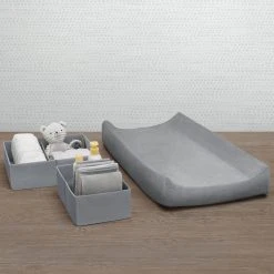 Delta Children 7-Piece Essential Changing Table Set - Newborn Baby Gift Set For Boys And Girls – Set Includes Changing Pad, Plush Changing Pad Cover, 3 Changing Pad Liners And 2 Storage Bins 25 Delta Children 7-Piece Essential Changing Table Set - Newborn Baby Gift Set For Boys And Girls – Set Includes Changing Pad, Plush Changing Pad Cover, 3 Changing Pad Liners And 2 Storage Bins