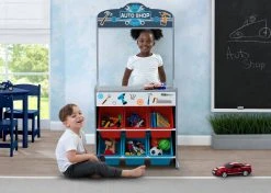 Delta Children Reversible 4-in-1 Pretend Play Center With Chalkboard & Storage